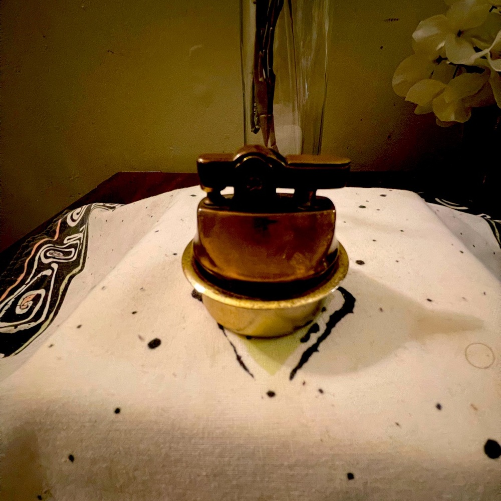 VTG. SIGNED“TELSTAR” ROUND BRASS TABLETOP W/HOLDER..APPROX.2”
